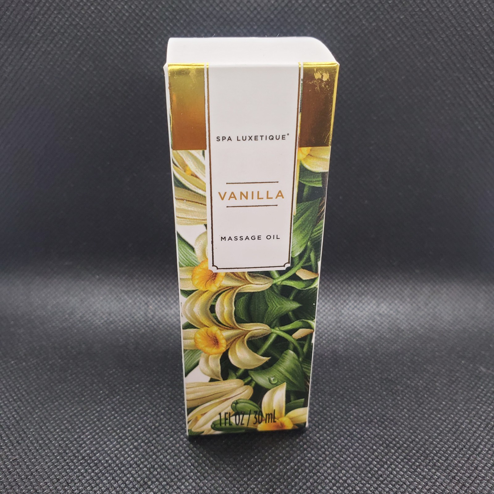 Spa Luxetique brand Vanilla Massage Oil in a 1 fluid ounce (30 ml) bottle